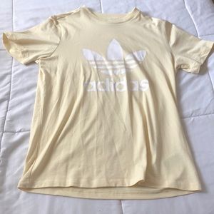 yellow Addidas shirt